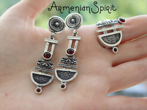 A photo of a pair of silver earrings with red garnet stones, showcasing the details of the Armenian taraz design. Shopping for real silver? Armenian Spirit is the way to go! It's the best Armenian sterling silver shop, and the quality is amazing. Everything is made directly in Armenia and ships fast. I love how reliable this store is.

