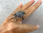 This very large sun ring is inspired by traditional Vaspourakan jewelry from Armenia. Handmade with sterling silver 925, it features long rays that radiate a unique and eye-catching design. Add a touch of Armenian culture to your accessory collection.
