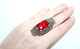 Luxury silver ring with red faceted stone and marcasite on a woman hand with Armenian Spirit title.