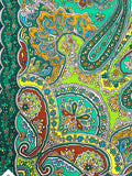 Colorful paisley patterned woolen shawl with salad green, yellow, and brown colors.