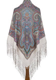  A cozy, blanket-style winter shawl made from 100% merino wool. The design blends heritage Slavic patterns in soft ivory, muted gray, and slate blue, wrapped snugly to emphasize its thick, warm texture.