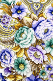 Colorful floral shawl with blue, purple, and green flowers on a decorative background.