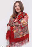 Woman wearing a red floral patterned scarf which can be used as Slavic dancers accessory.