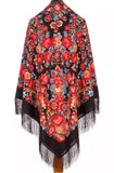 Colorful floral patterned shawl with fringes in traditional flamenco Spanish style. Perfect to buy for flamenco dancers online.