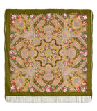 Decorative woolen scarf with peony and paisley patterns on a green background with fringe.