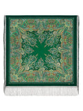 Green paisley patterned shawl with tassels on a white background