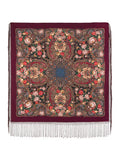 Decorative scarf with vintage peony patterns and fringes on a wine red background. A generously sized square shawl in wine red featuring vintage peony florals in gentle pink and beige hues. Made from soft merino wool, this oversized wrapping scarf is perfect for graceful layering and warmth.