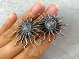 Introducing our Sterling Silver 925 handmade Armenian jewelry collection. These sun earrings are adorned with very long stud rays, inspired by Armenian Vaspourakan jewelry. Made with pure silver 925, these art pieces are the perfect addition to any outfit. Elevate your style with our unique and timeless sun earrings with long rays.
