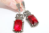 Vintage red stone earrings made of marcasite and sterling silver in vintage style. The earrings are oversized and luxury.