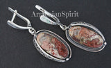 Very long oval earrings crazy lace agate sterling silver made by Armenian artisans. The jewelry is unique and not mass market. These types of jewelry you can find on ruby lane.