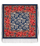 Floral patterned shawl with red roses and white floral design on a blue background