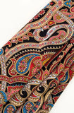 Close-up of a colorful paisley patterned woolen high quality shawl online.
