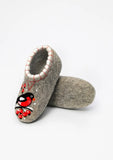 Ugg style woolen slippers with rowan berry and bullfinch.