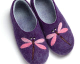 A pair of purple felt house slippers with pink dragonfly embroidery on the front.