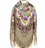 Colorful floral-patterned scarf with fringe made of natural sheep wool