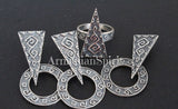 A set of silver jewelry including earrings, a ring, a pendant, and a bracelet with geometric patterns, displayed against a black background.