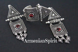 A set of sterling silver 925 jewelry, including earrings and a ring with a red stone, displayed against a dark background with the text 'ArmenianSpirit' visible.