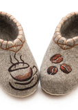 Pair of gray woolen slippers with coffee-themed design on a white background