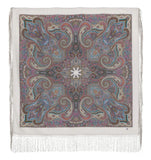 An oversized blanket-style shawl crafted from merino wool, displaying a traditional Slavic pattern in a calm palette of gray, ivory, and blue with long fringe borders.