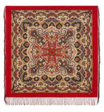 Decorative square red shawl with intricate beige and yellow patterns and a red fringe