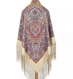 Pink patterned extra large wrapping shawl in boho style with fringes and mandala Indian ornaments on a white background