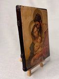 Religious home decor wood panel icon of the Holy Family for church or chapel decoration. Handmade Catholic wood plaque showing the Holy Family protected by durable clear lacquer.