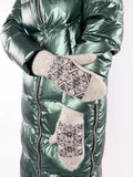 A pair of fluffy light grey wool mittens featuring a traditional winter Nordic  pattern with snowflakes. The top and bottom sections display black geometric snowflake bands, all set against a clean gray background.