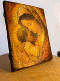 Madonna and Child religious painting on a solid wood block with a rustic finish.