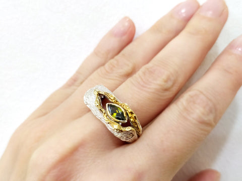 Modern ring Sterling silver 925 with gold plated surface and yellowish green stone