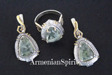 Jewelry set with pendants and a ring featuring green gemstones on a black background, branded 'Armenian Spirit'.