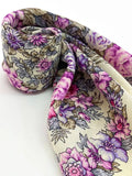 Floral patterned headband shawl with purple and peony flowers on a white background