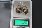 Add a touch of unique handmade beauty to your collection with our Sterling Silver 925 Armenian jewelry. Crafted with coconut jasper natural gemstone in a stripped caramel yellow and brown design, each oval piece is one of a kind. Made with high-quality sterling silver, this jewelry is sure to make a statement.
