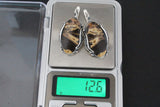 Add a touch of unique handmade beauty to your collection with our Sterling Silver 925 Armenian jewelry. Crafted with coconut jasper natural gemstone in a stripped caramel yellow and brown design, each oval piece is one of a kind. Made with high-quality sterling silver, this jewelry is sure to make a statement.
