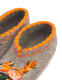 Women woolen slippers for winter cold season with a squirrel or fox embroidery.