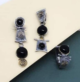 Jewellery set from armenian artisans made of sterling silver 925 and round small and middle size onyx gemstones. \the earrings has unique and interesting assymetric  design.