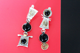 Do you want to buy Armenian jewelry? You like black stone earrings with gold plated parts? Pay attention to these silver earrings with assymetric design and eternity symbols.