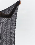 A photo of  lightweight gossamer pashmina shawl in black.