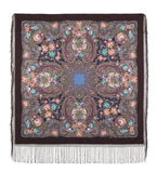 Brown square scarf with peach floral patterns and fringes on a black background