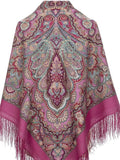 Pink and multicolor patterned scarf with fringes on a white background