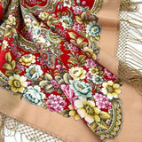 A thick and opaque red woolen textile swatch, featuring traditional vintage peony arrangements in bright pink and golden yellow.