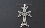 A reversible heavy silver cross pendant with Armenian Apostolic church designs, featuring an Armenian khachkar pattern on one side and eternity ornament on the other.