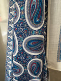 Shawl with blue and red paisley pattern on a white background