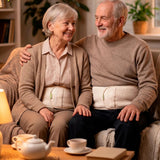Breathable spinal posture corrector wrap under clothing worn by a woman with her hand on her hip to display the slim profile and seamless design perfect for daily wear or outdoor work. 