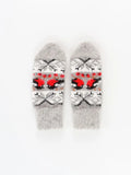 Close-up view of cozy winter handwarmers knitted from a soft 80 percent wool blend for premium insulation in freezing cold weather. The design safely combines neutral grey tones with striking holiday red accents on a heavily brushed fabric texture.