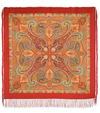 Decorative throw blanket shawl made of merino wool with intricate paisley pattern on a red background