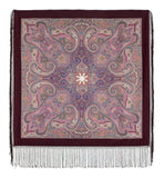 Square merino wool shawl with indian paisley pattern and fringes on a white background