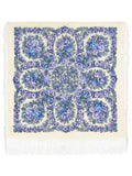 Floral patterned merino wool scarf with blue and purple flowers on a beige background