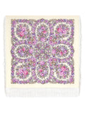 Floral patterned merino wool women shawl with pink and purple flowers on a beige background
