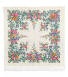 Floral patterned vintage woolen scarf with colorful flowers and green leaves on a white background