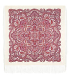 Square red and white mandala Indian style patterned shawl blanket with fringes on a beige background